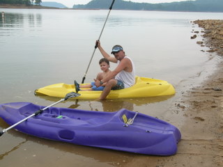 Lake kayak with Dad and son
